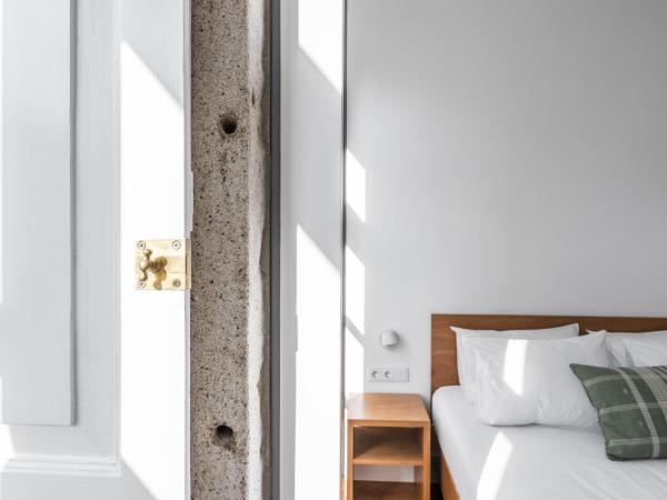 Avenida Viana Boutique Suites : photo 3 de la chambre chambre double avec balcon