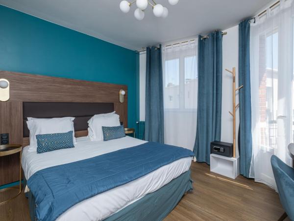 The Originals Boutique, Hôtel Le Marignan,Le Havre Centre Gare : photo 1 de la chambre chambre double ou lits jumeaux deluxe avec balcon