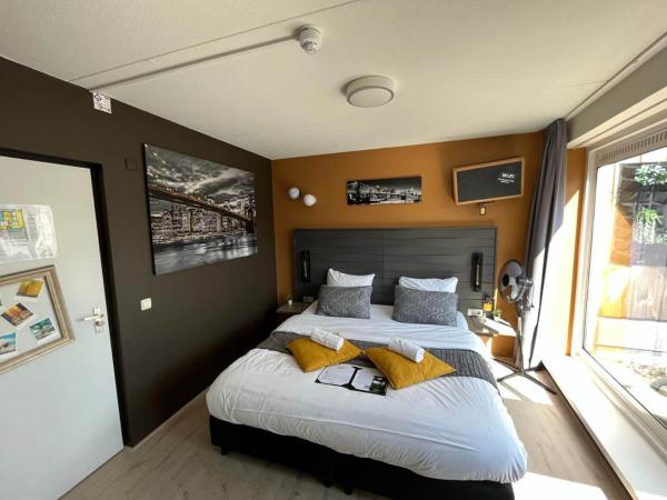 Hotel The Happy Traveler : photo 1 de la chambre chambre double ou lits jumeaux deluxe avec balcon