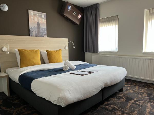 Hotel The Happy Traveler : photo 1 de la chambre chambre deluxe double ou lits jumeaux