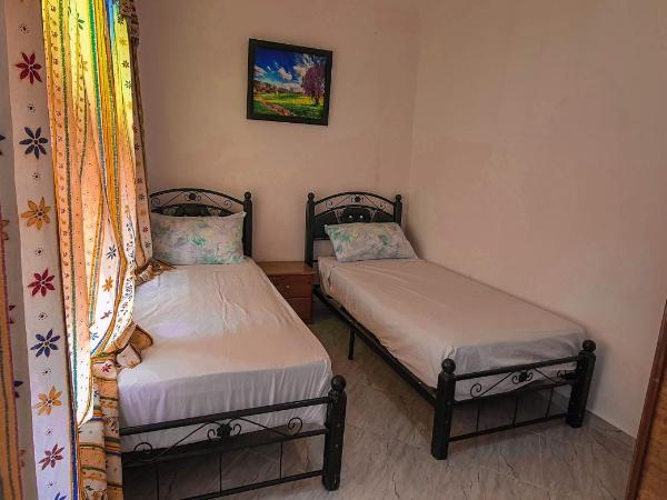 The Sunrise Villa : photo 4 de la chambre chambre lits jumeaux - vue sur mer