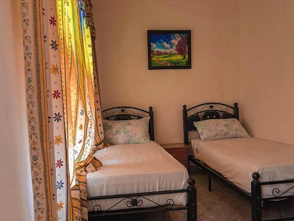 The Sunrise Villa : photo 3 de la chambre chambre lits jumeaux - vue sur mer