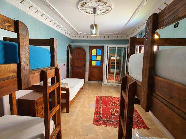 The Sunrise Villa : photo 5 de la chambre chambre familiale - vue sur jardin