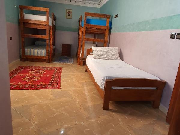 The Sunrise Villa : photo 6 de la chambre chambre familiale - vue sur jardin