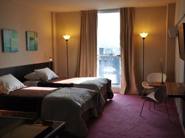 Uno Buenos Aires Suites : photo 2 de la chambre chambre triple supérieure