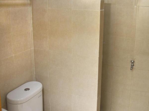 Hersya Front One Inn Surabaya : photo 1 de la chambre chambre lits jumeaux supérieure