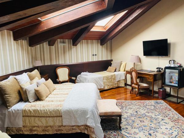 Hotel Dei Pittori : photo 10 de la chambre liberty family room