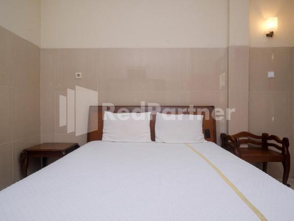 Wisma Garuda Syariah Condoongcatur Mitra RedDoorz : photo 8 de la chambre chambre double standard