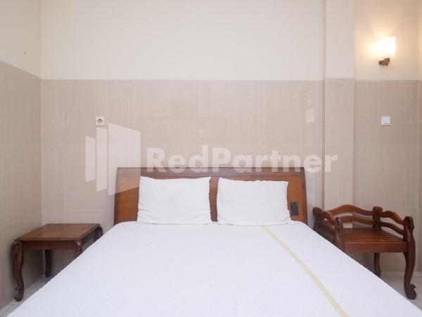 Wisma Garuda Syariah Condoongcatur Mitra RedDoorz : photo 5 de la chambre chambre double standard
