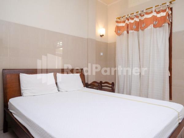 Wisma Garuda Syariah Condoongcatur Mitra RedDoorz : photo 4 de la chambre chambre double standard