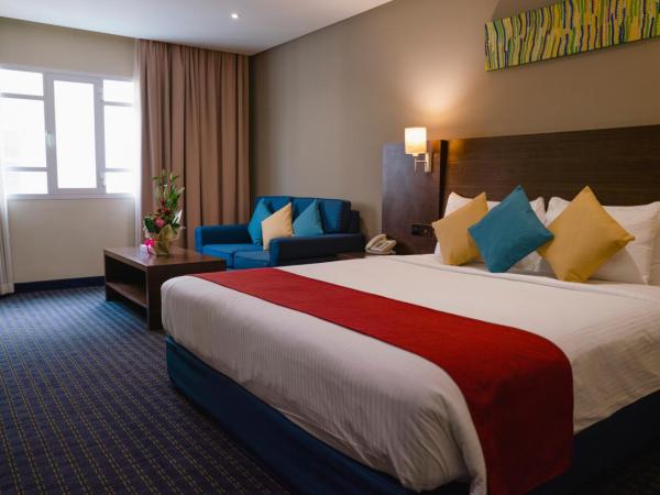 Best Western Premier Muscat : photo 1 de la chambre chambre lits jumeaux supérieure - vue sur ville