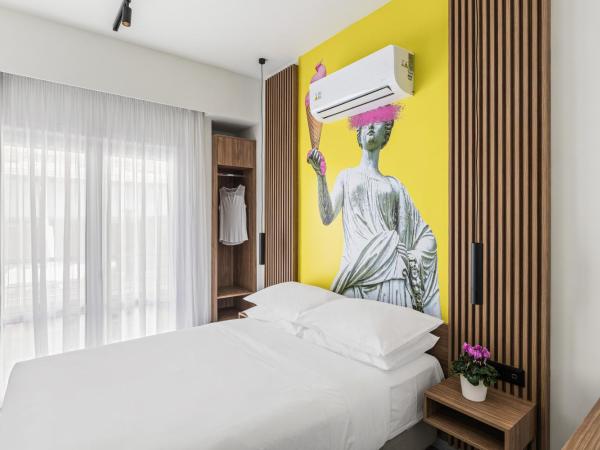 The Q Hotel : photo 1 de la chambre cosy q