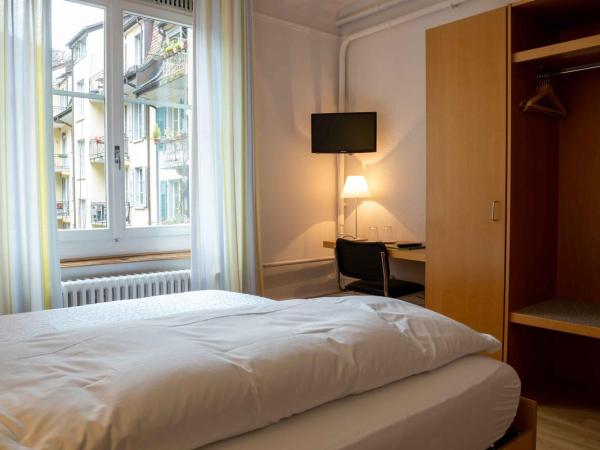 Hotel Marthahaus : photo 6 de la chambre chambre lits jumeaux avec salle de bains privative