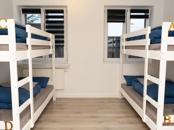 Downtown Apartments : photo 1 de la chambre lit dans dortoir pour hommes de 4 lits