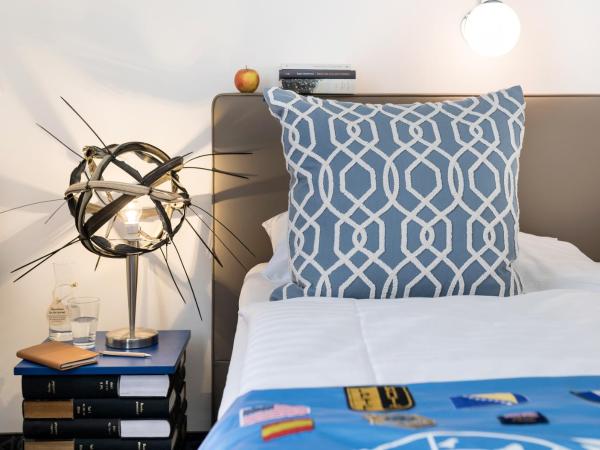 Boutiquehotel Stadthalle : photo 1 de la chambre cozy single room courtyard view