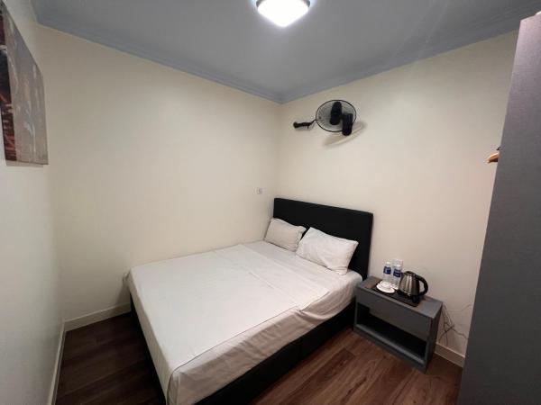 Al Amin Muslim Friendly Hotel : photo 6 de la chambre chambre simple avec toilettes et douche communes