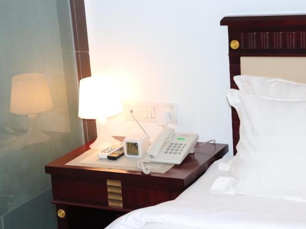 Al Amin Muslim Friendly Hotel : photo 3 de la chambre chambre double avec salle de bains privative