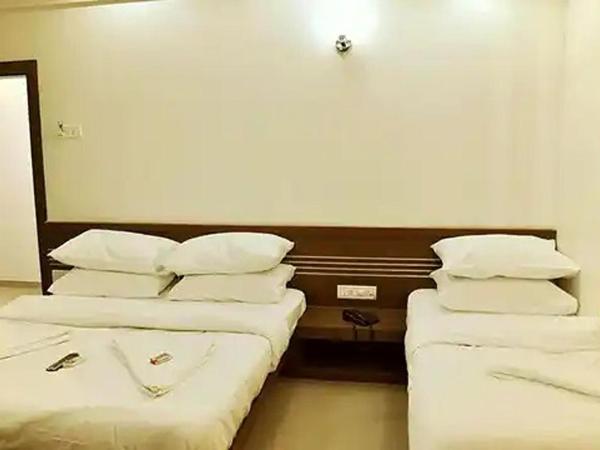 Hotel Lotus Inn : photo 5 de la chambre chambre familiale