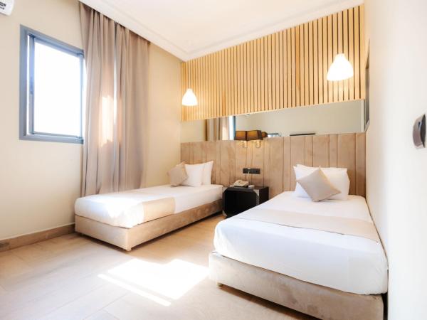 Ennesma Hotel : photo 3 de la chambre chambre lits jumeaux