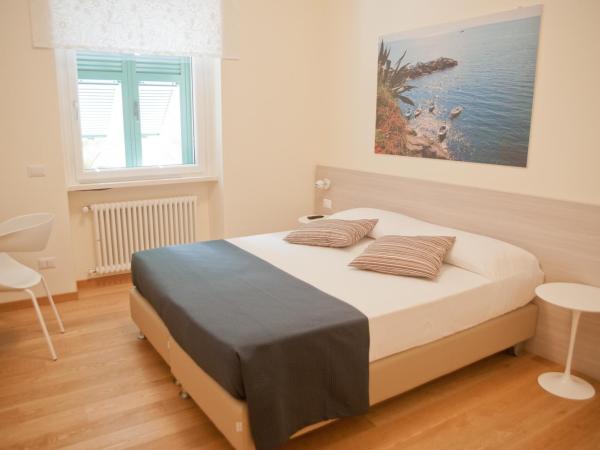 B&B Via delle 5 Terre : photo 7 de la chambre chambre double ou lits jumeaux - vue sur jardin