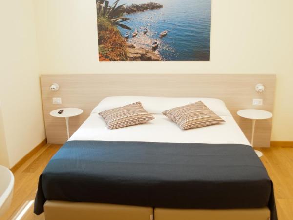 B&B Via delle 5 Terre : photo 6 de la chambre chambre double ou lits jumeaux - vue sur jardin