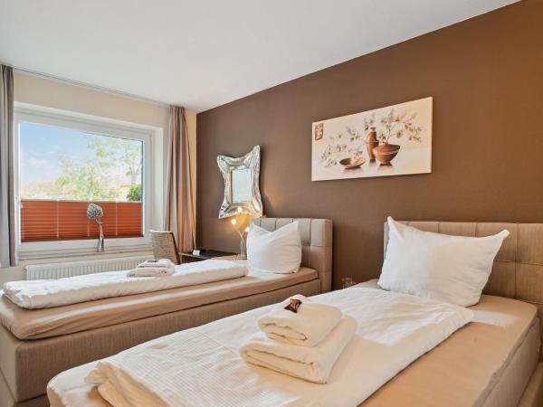 7o'Clock - Hannover Laatzen : photo 6 de la chambre chambre double ou lits jumeaux