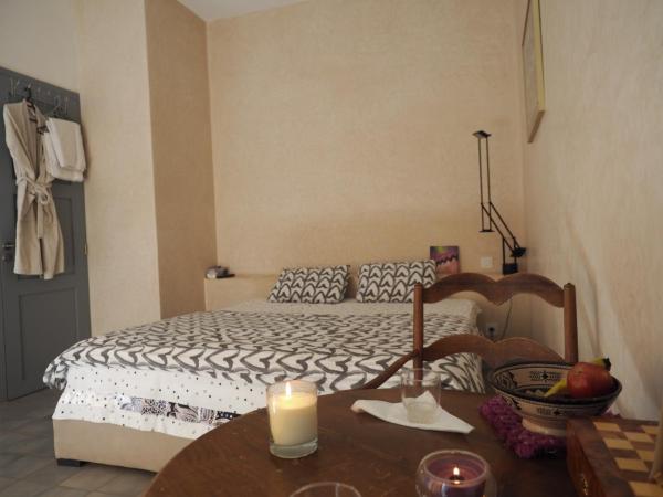 Tigmi Anis : photo 5 de la chambre chambre lit queen-size - vue sur mer