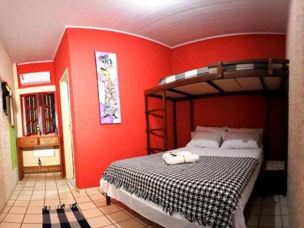 Hostel Cores do Pelô : photo 1 de la chambre chambre triple exécutive