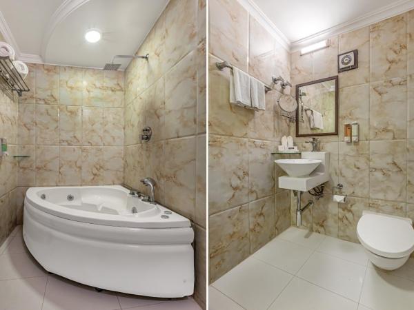 3 BY OYO Nami Residency Ahmedabad : photo 7 de la chambre chambre triple confort avec douche