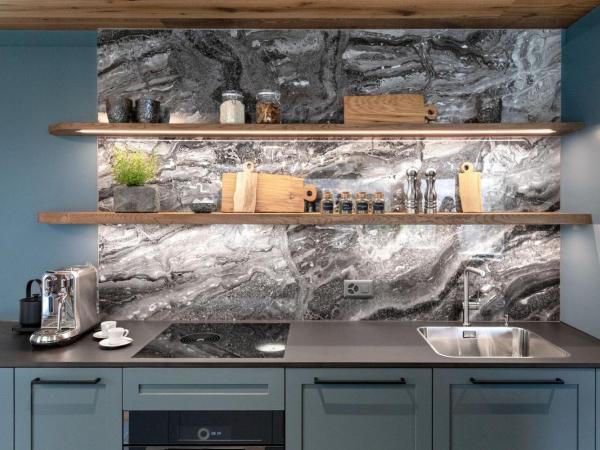 Tschuggen Grand Hotel - The Leading Hotels of the World : photo 1 de la chambre suite two-bedroom mountain loft