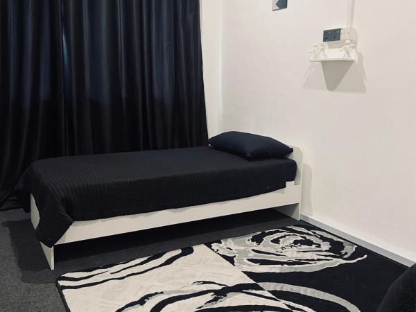 AK Greenrise Meru : photo 2 de la chambre chambre double ou lits jumeaux avec salle de bains commune