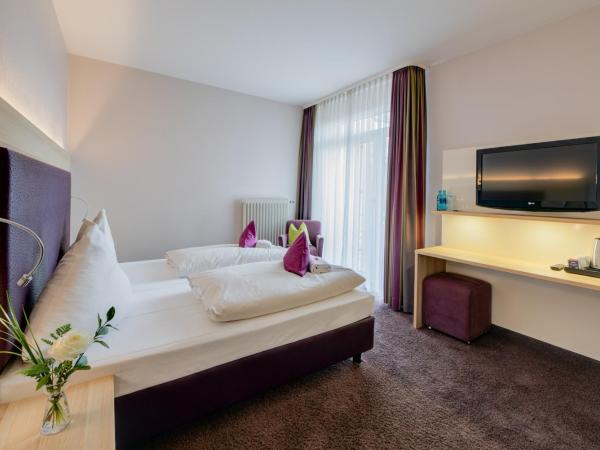 Concorde Hotel am Leineschloss : photo 4 de la chambre chambre double confort