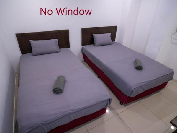 Heritage Inn : photo 3 de la chambre chambre lits jumeaux avec salle de bains privative