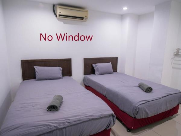 Heritage Inn : photo 4 de la chambre chambre lits jumeaux avec salle de bains privative