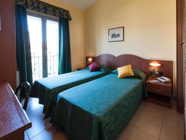 The Best Hotel : photo 2 de la chambre chambre lits jumeaux