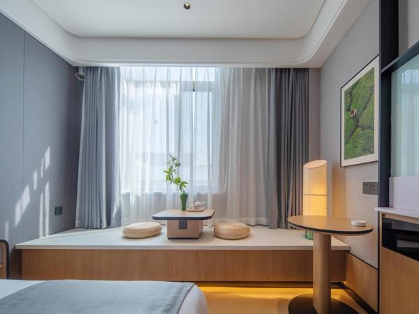Pero Hotel Qingdao Expo City : photo 2 de la chambre chambre double affaires