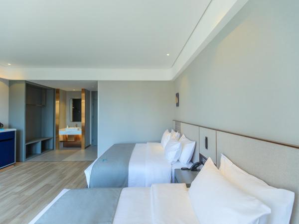 LanOu Hotel Qingdao West Station Haixi Road : photo 2 de la chambre chambre familiale deluxe