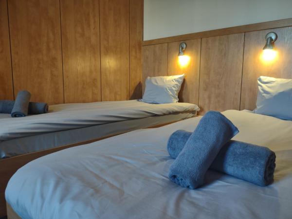 Warsaw Apartments Magnolie : photo 3 de la chambre chambre lits jumeaux