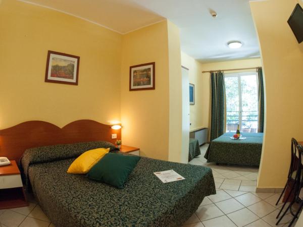 The Best Hotel : photo 1 de la chambre chambre quadruple