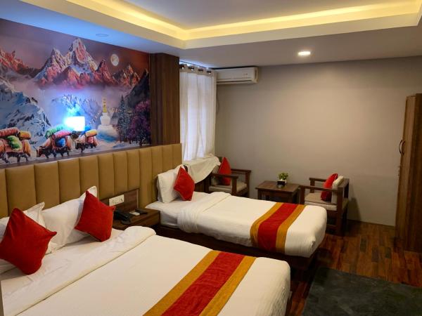 Redstone Regency Hotel : photo 7 de la chambre chambre familiale deluxe