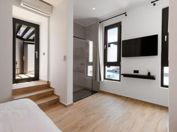 Laguna Suites in Mazera Mykonos : photo 5 de la chambre chambre lit queen-size - vue sur piscine