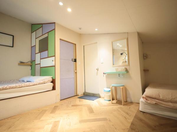 SISnBRO Guesthouse : photo 4 de la chambre chambre quadruple confort