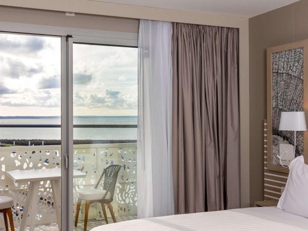 Hilton Garden Inn Le Havre Centre : photo 1 de la chambre chambre lit king-size deluxe - vue sur mer