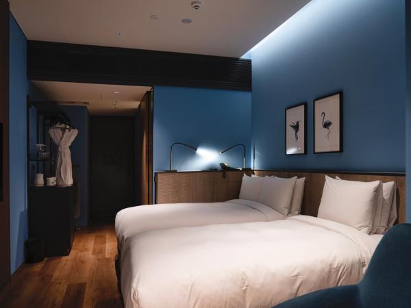 voco Seoul Gangnam, an IHG Hotel : photo 2 de la chambre premium room with one double and one single bed