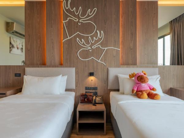 Moose Hotel Chiangmai : photo 3 de la chambre chambre lits jumeaux avec douche 