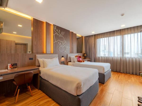 Moose Hotel Chiangmai : photo 1 de la chambre chambre lits jumeaux avec douche 