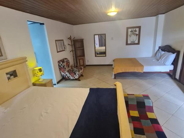 Pousada Mar'Tito Forno : photo 5 de la chambre chambre triple