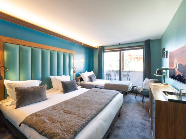 Fahrenheit Seven Courchevel : photo 5 de la chambre chambre triple avec baignoire - vue sur village