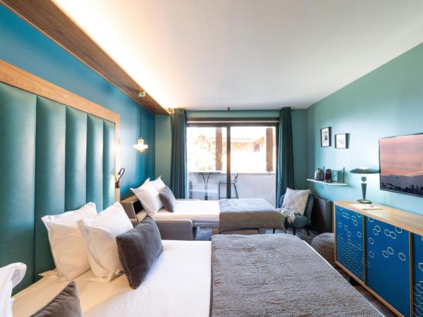 Fahrenheit Seven Courchevel : photo 6 de la chambre chambre triple avec baignoire - vue sur village