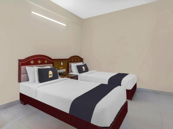 Church's Inn Near Cubbon Park : photo 4 de la chambre chambre triple classique